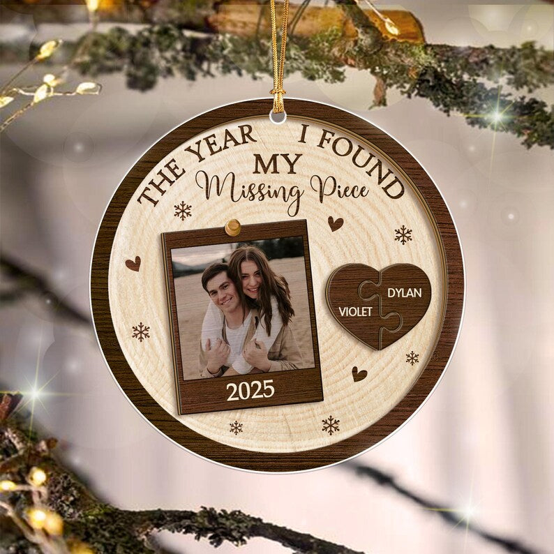 A round wooden ornament featuring the text THE YEAR I FOUND MY Missing Piece and 2025.