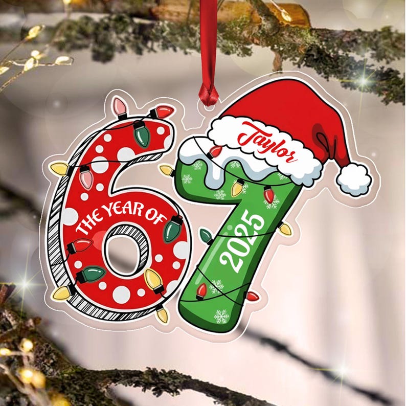 A holiday ornament shaped like the number 67, with the red number 6 featuring white polka dots and the green number 7 wearing a Santa hat.