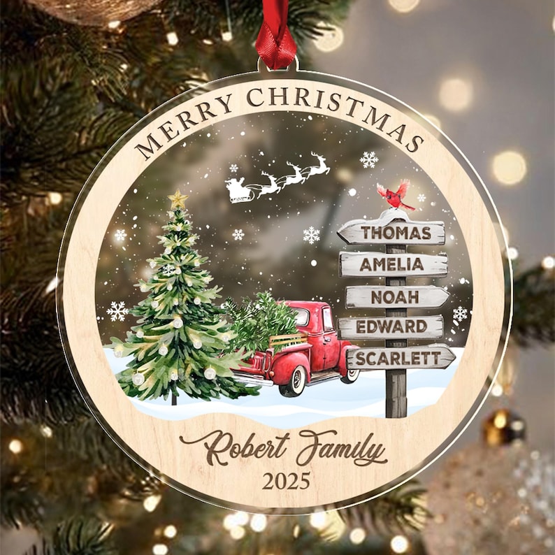 A round, clear acrylic Christmas ornament with a wooden border.