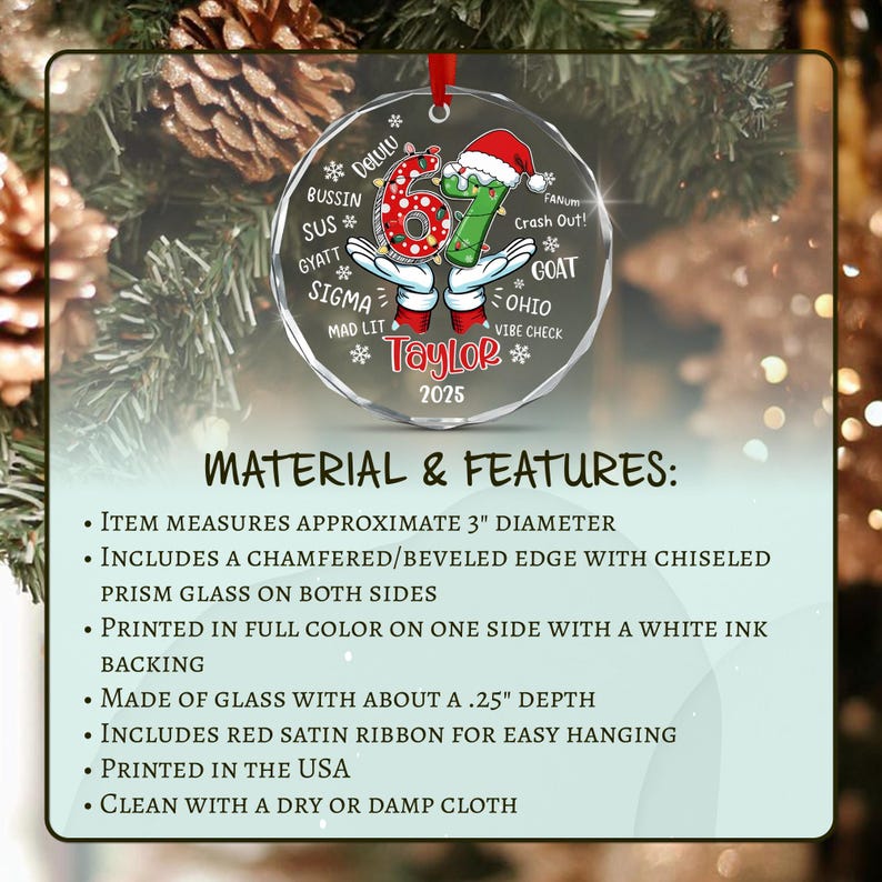 A circular glass ornament with a 3-inch diameter, featuring a red ribbon, a graphic of the number 67 wearing a Santa hat, and the text Taylor 2025 surrounded by slang terms like Bussin, Sus, Gyatt, Sigma, Mad Lit, Fanum, Crash Out.