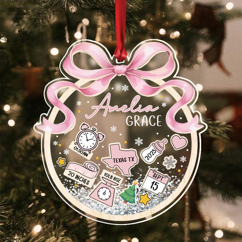 A personalized Christmas ornament with the name "Amelia Grace" in script.