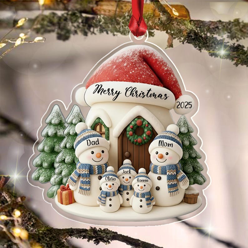 A flat Christmas ornament featuring a house topped with a red Santa hat, labeled Merry Christmas 2025.