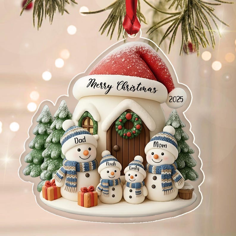 A flat Christmas tree ornament featuring a house topped with a red Santa hat, labeled Merry Christmas 2025.