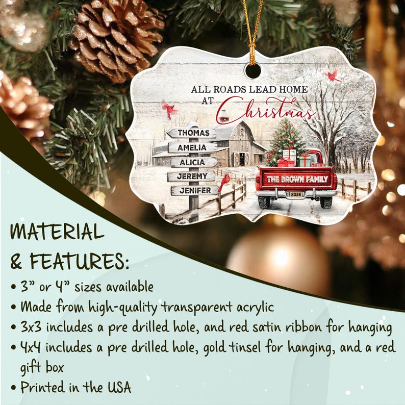 A decorative ornament with a scalloped edge featuring a winter scene with a red truck, a barn, and a signpost with the names Thomas, Amelia, Alicia, Jeremy, and Jenifer.