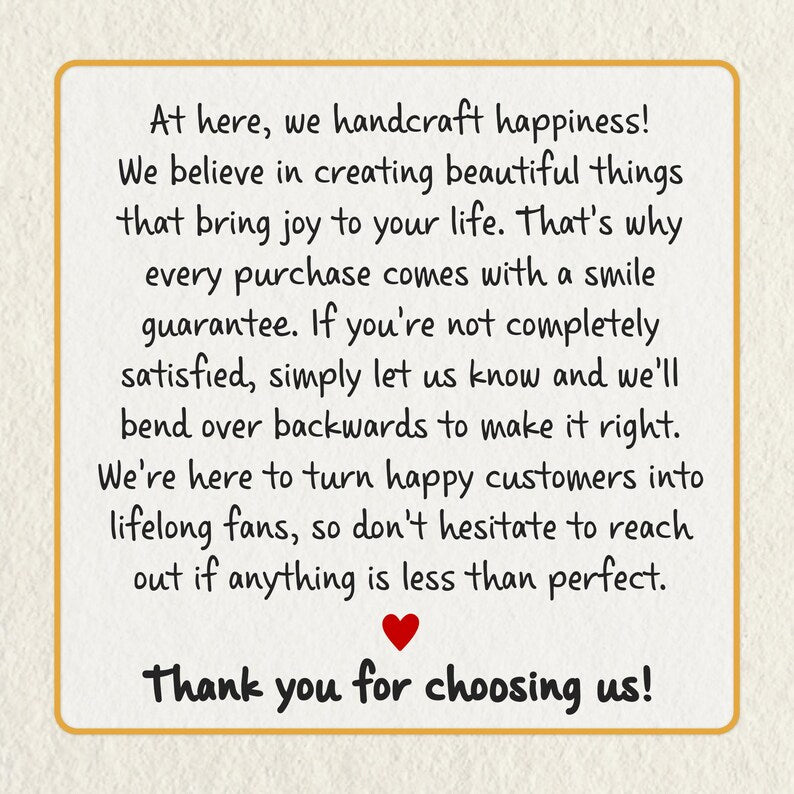 A square card with a gold border featuring black printed text that reads: At here, we handcraft happiness! We believe in creating beautiful things that bring joy to your life.
