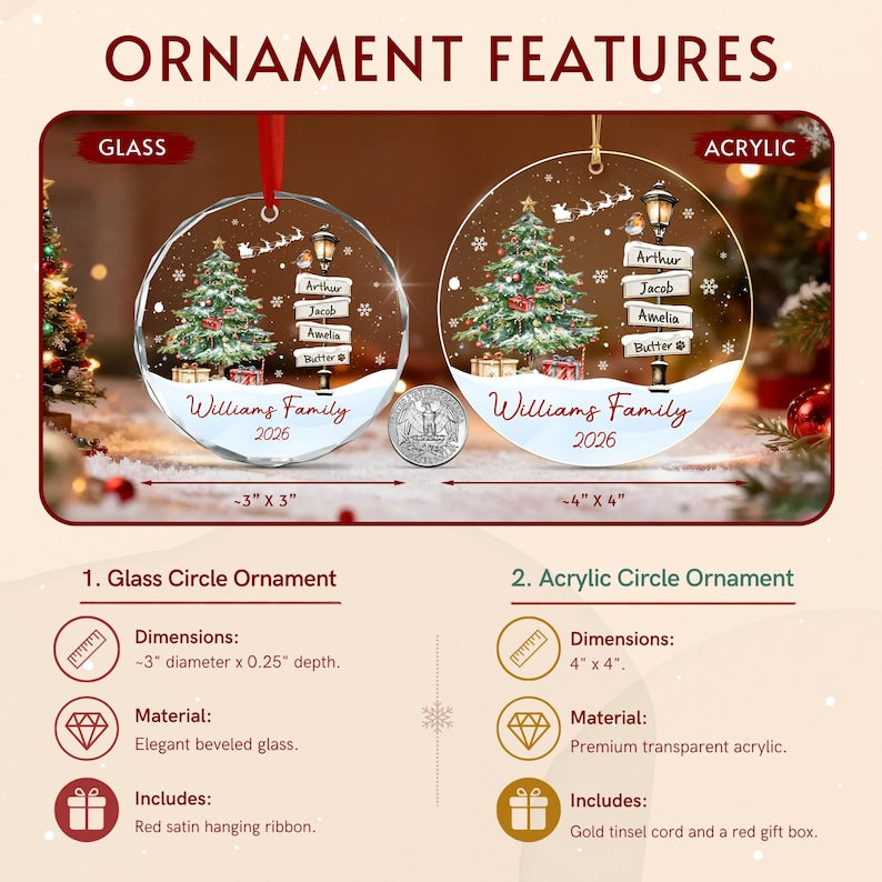 Two circular Christmas ornaments, one glass and one acrylic, featuring a printed scene of a decorated tree, a street lamp with signs reading Arthur, Jacob, Amelia, and Butter, and the text Williams Family 2026.