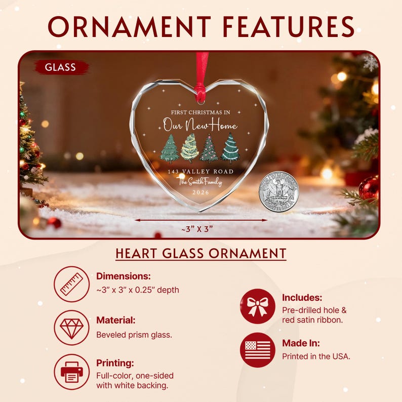 A heart-shaped beveled glass ornament with a red ribbon, featuring the text First Christmas in Our New Home, 143 Valley Road, The Smith Family, and 2026, with four illustrated pine trees. It measures 3 inches by 3 inches.