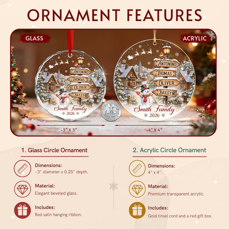 Two round Christmas ornaments, one glass and one acrylic, featuring a winter village scene with a snowman, a signpost with the names Antonino, Thomas, Oliver, and Bailey, and the text Smith Family 2026.