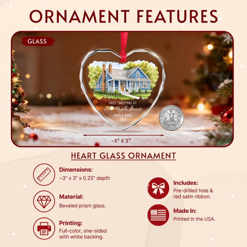 A heart-shaped beveled prism glass ornament featuring a printed illustration of a blue house. The text reads FIRST CHRISTMAS AT 264 MAPLE STREET JAVIS & ROXIE 2026.