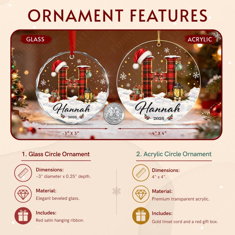 Two circular Christmas ornaments, one glass and one acrylic, each featuring a red plaid letter H, a Santa hat, gifts, a lantern, and the name Hannah with the year 2026.