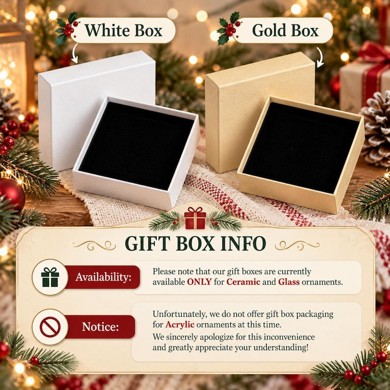 A white gift box and a gold gift box, both featuring black velvet inserts.
